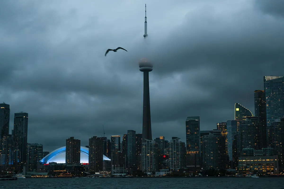 Toronto skyline and CN Tower under clouds
